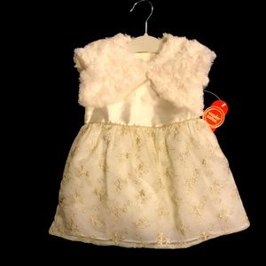 100% polyester dress w/embroidery & lining including a faux fur vest!